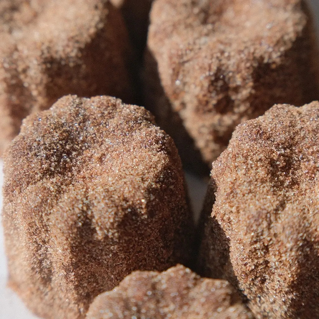 Close Up View of Churro Canele Assortment