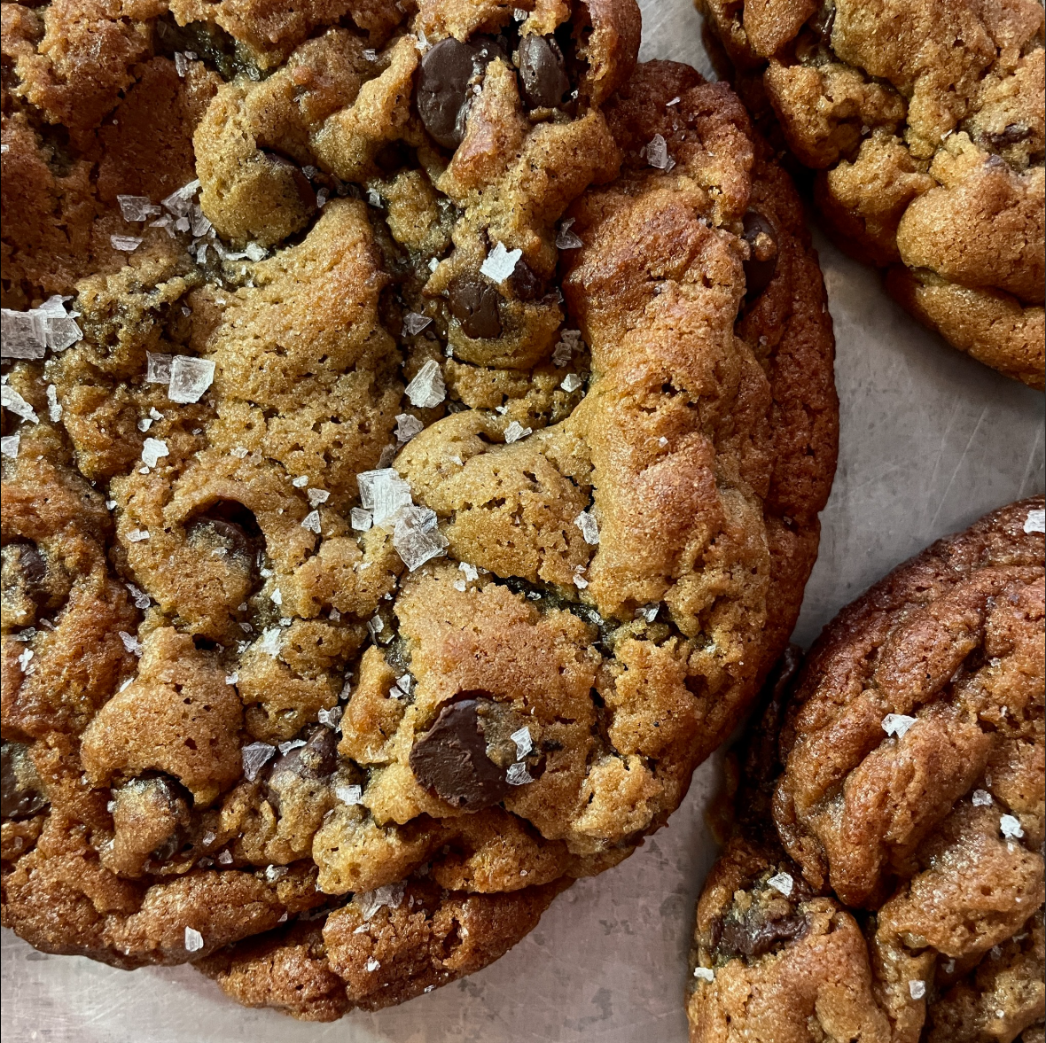 A close up view of our miso chocolate chip cookie with maldon sea salt. 