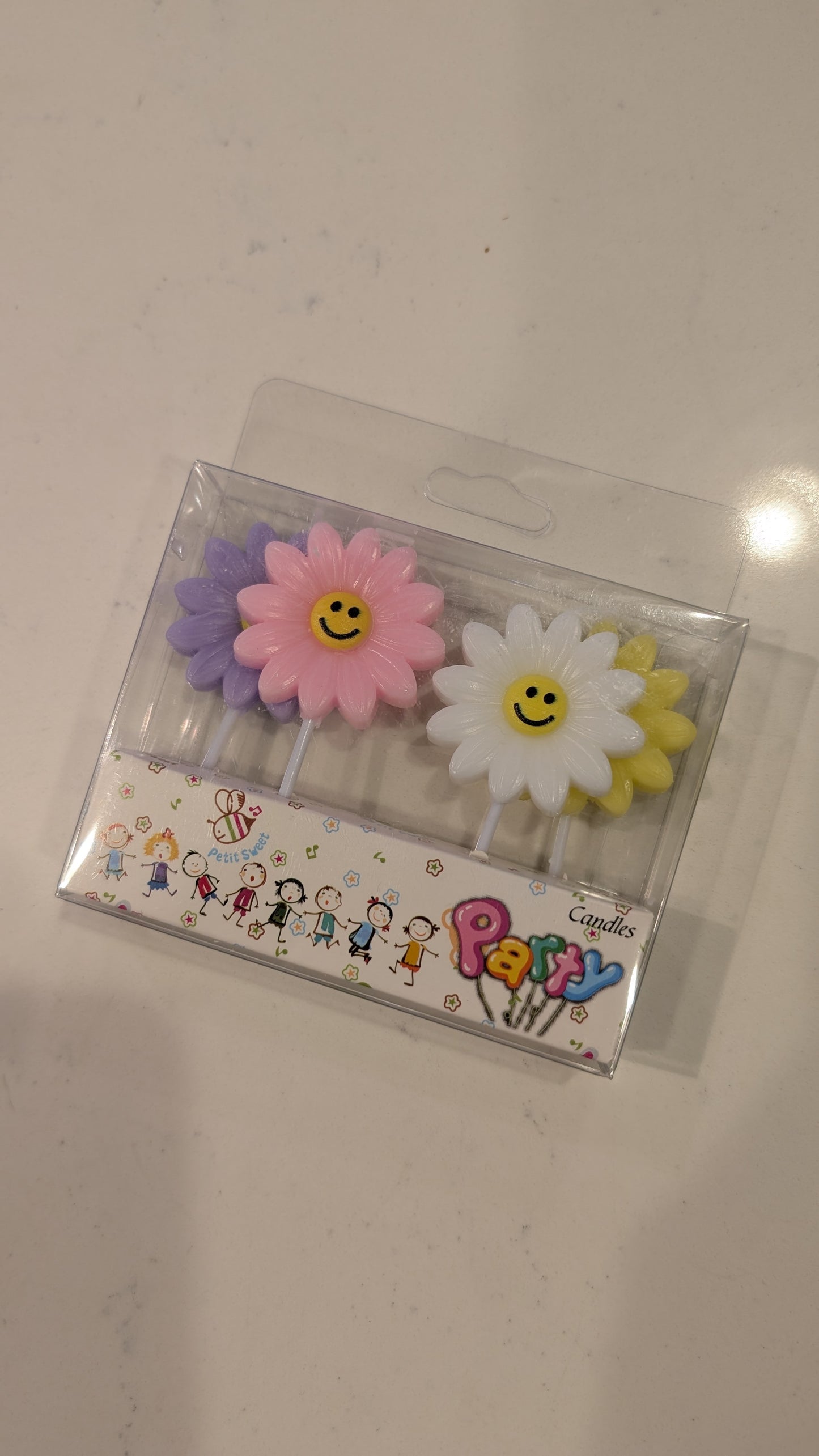 Top View of Smiling Daisy Candles