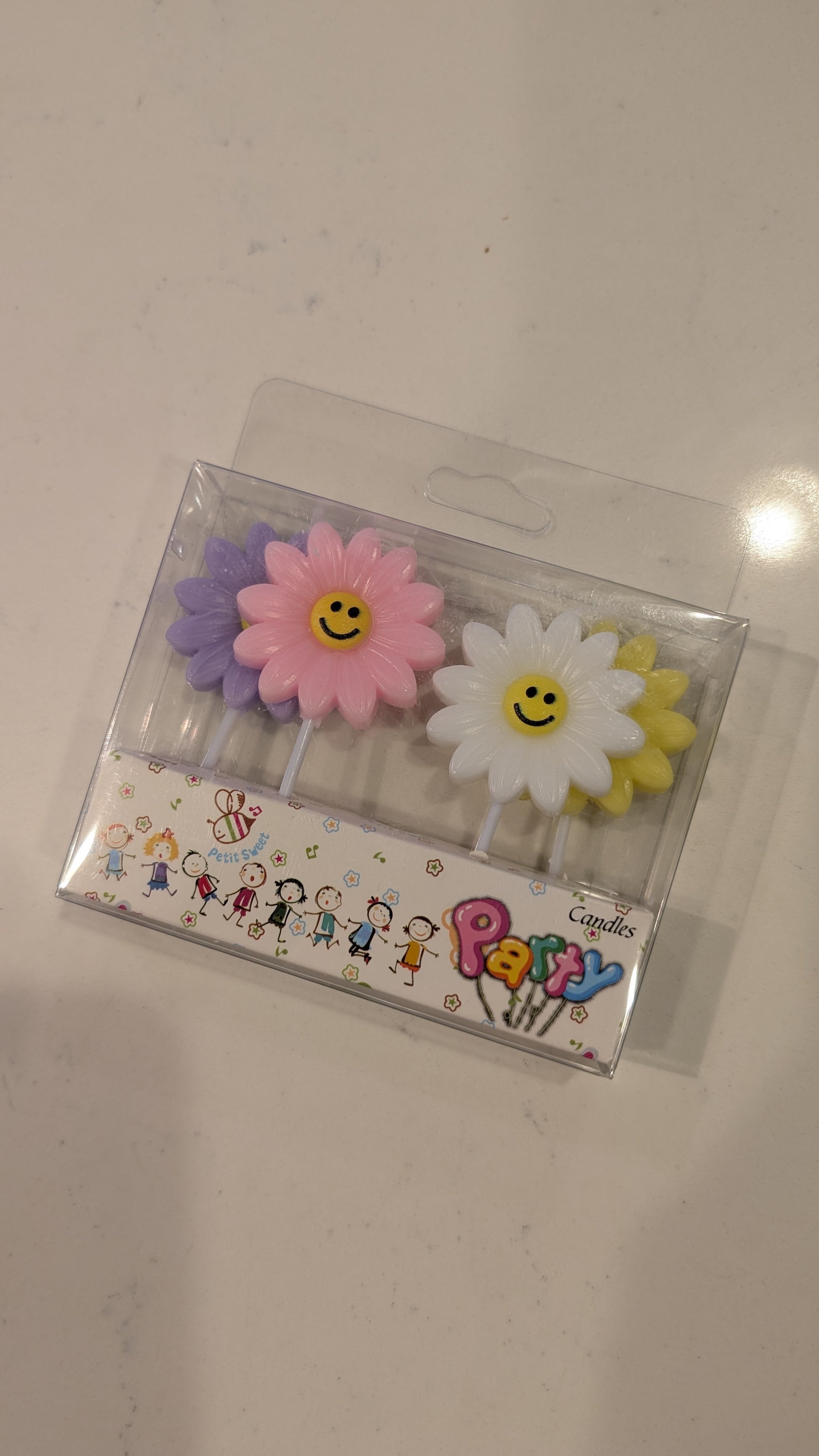 Top View of Smiling Daisy Candles